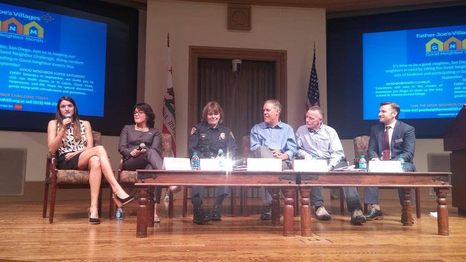 a seated panel of speakers