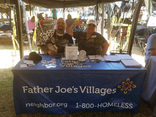 Father Joe's Villages Volunteers at a Table