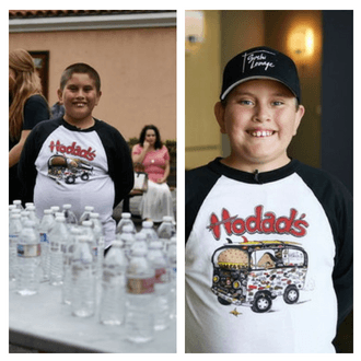 Kids Volunteer San Diego | Phillip stands next to the many water bottles he collected in Father Joe's Villages courtyard.