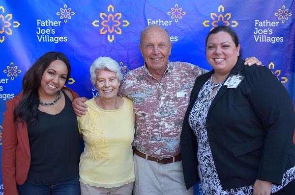 Betty & Cary Becker pose with staff members from Father Joe's Villages at Landlord Appreciation event. | Landlord Incentives Program