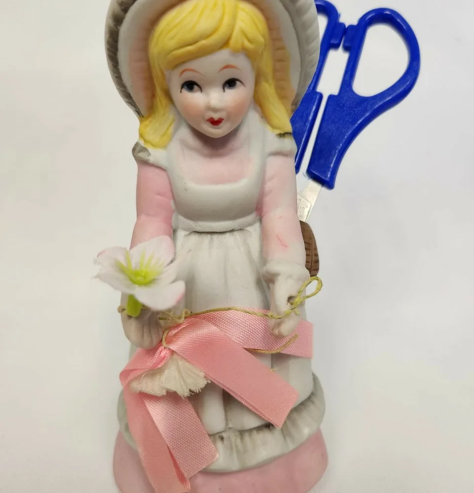 Porcelain Sewing Girl Figurine